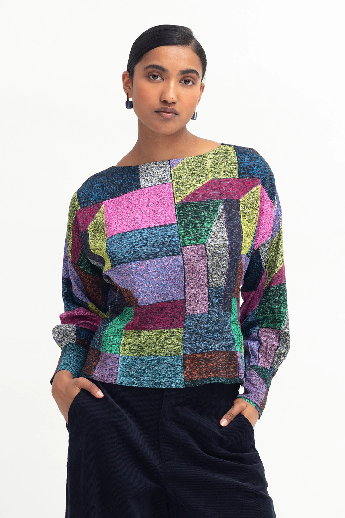 
                  
                    Del Top | Midja Print The Del Top is a cropped, boat neck top with a back keyhole finish. It features a dropped shoulder, a long puff sleeve, and gathers at an exaggerated cuff with a button closure. The top has double darts at the bodice for an accentuated shape, and an invisible zip at the side of the body.
                  
                