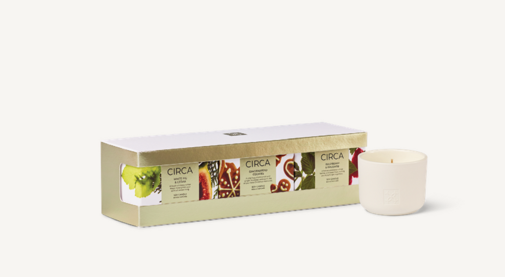 Christmas Candle Trio Three festive 70g Candles to celebrate the season&nbsp; - Raspberry &amp; Rhubarb, Pine &amp; White Fig, and Gingerbread Cookies. A perfect gift set, or a collection to share.