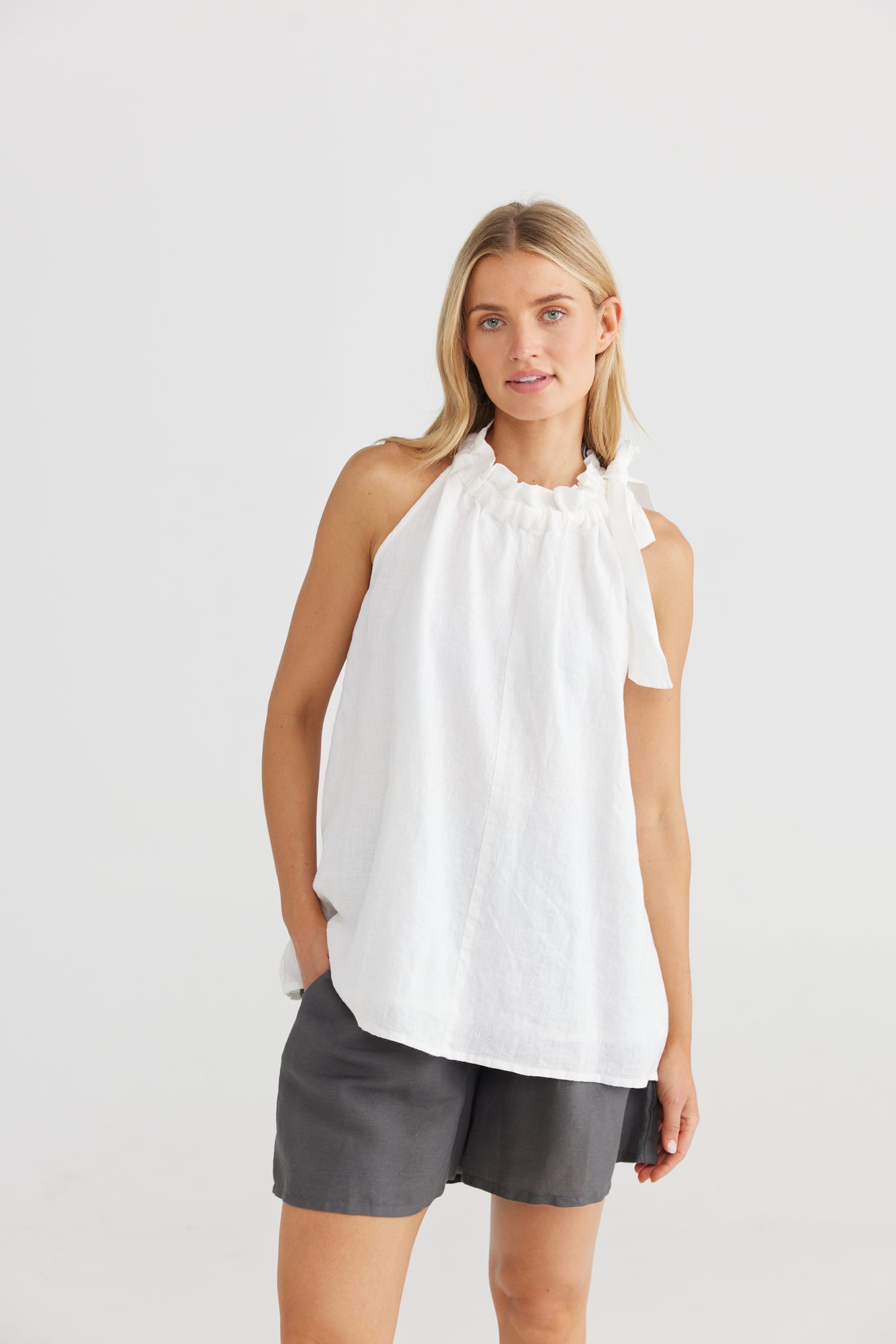 
                  
                    Lucia Top Floaty, relaxed fit Halter neck Paper bag drawstring neckline Charcoal - 55% Linen, 45% Viscose White - 100% Linen, lining 100% cotton
                  
                