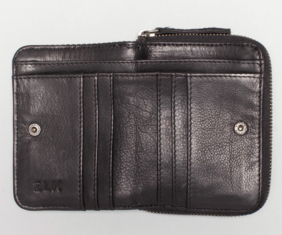 
                  
                    Lisser Wallet l Black The Lisser Wallet is a small, everyday wallet designed to match our Lisser Crossbody Bag with the rib quilted leather detail. With a snap fastening closure and zip closure coin pouch, this wallet includes six card pockets and two separate note compartments for functional storage and ease of use.
                  
                