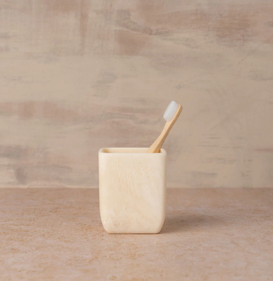 Flow Resin Toothbrush Holder | Marshmallow The Marshmallow Flow Resin Toothbrush Holder is distinctive and organic with its curved lines and marble finish. Each toothbrush holder is handmade and no two patterns are the same.  