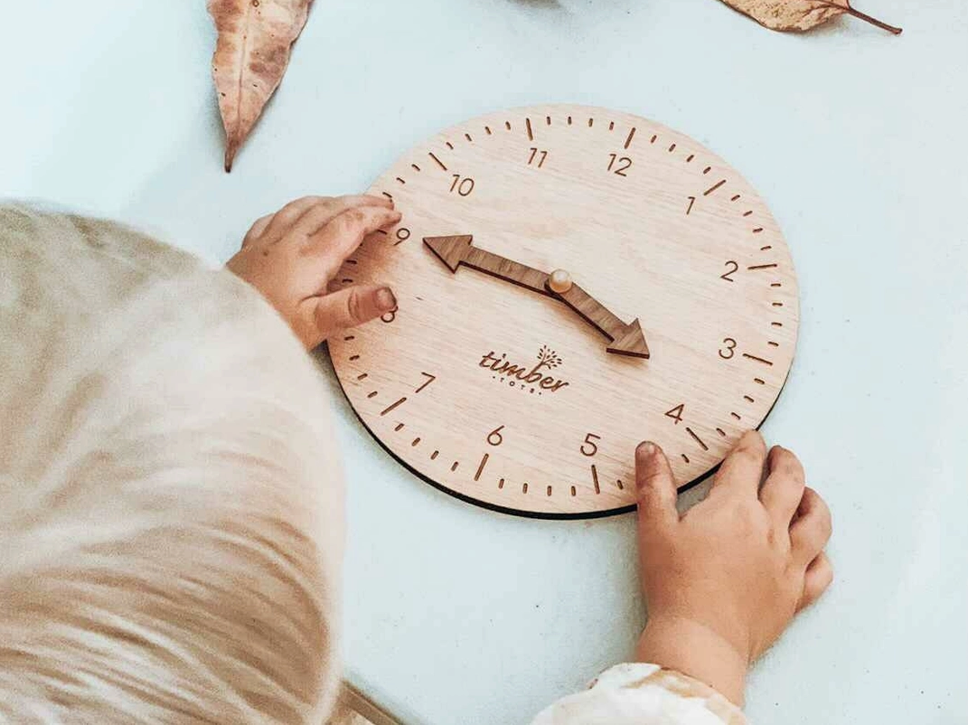 
                  
                    Montessori Timber Learning Clock This beautifully handmade timber learning clock will help little ones learn how to read the time. The clock & arrows are made from two different timbers to help with identifying minutes to hours.
                  
                