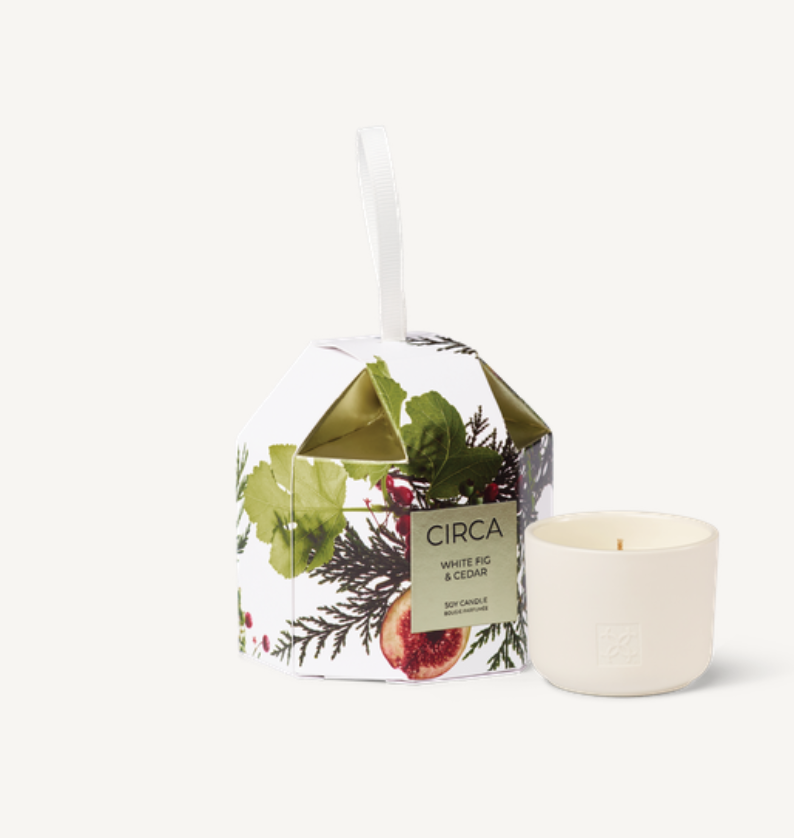 White Fig & Cedar Candle 70g Woody and inviting, this blend of White Fig &amp; Cedar is softened with Orchid and warm Spice. Pop it in a stocking or hang on the Christmas tree.&nbsp;