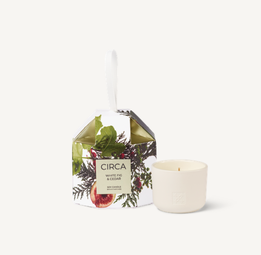 White Fig & Cedar Candle 70g Woody and inviting, this blend of White Fig &amp; Cedar is softened with Orchid and warm Spice. Pop it in a stocking or hang on the Christmas tree.&nbsp;