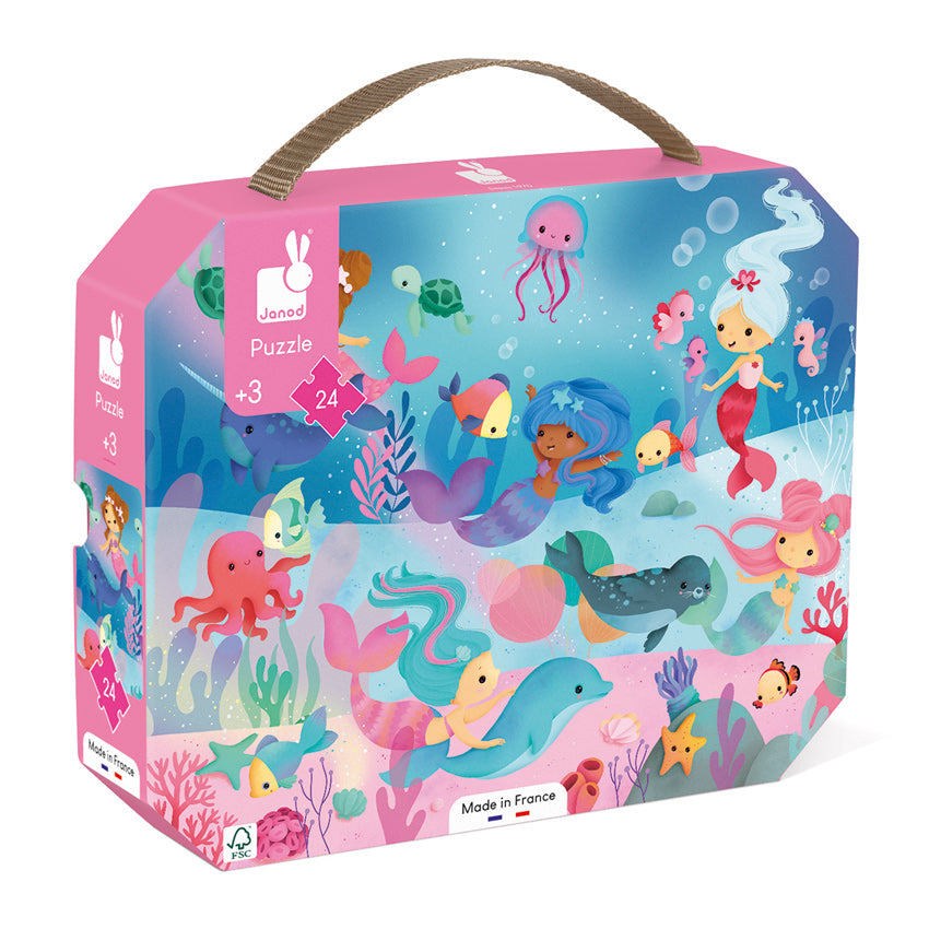 Mermaids Puzzle All little girls will want to join the magical mermaid adventure in this 24 piece jigsaw from Janod. Presented in the signature Janod suitcase with carry handle and made in France from sturdy FSC certified cardboard, the Mermaids Puzzle includes a poster to help with your mysterious exploration. Vegetable based inks offer enchanting colours of pink, blue and aqua depicting several mermaids and their friends from under the sea. Can you hear the mermaids call?