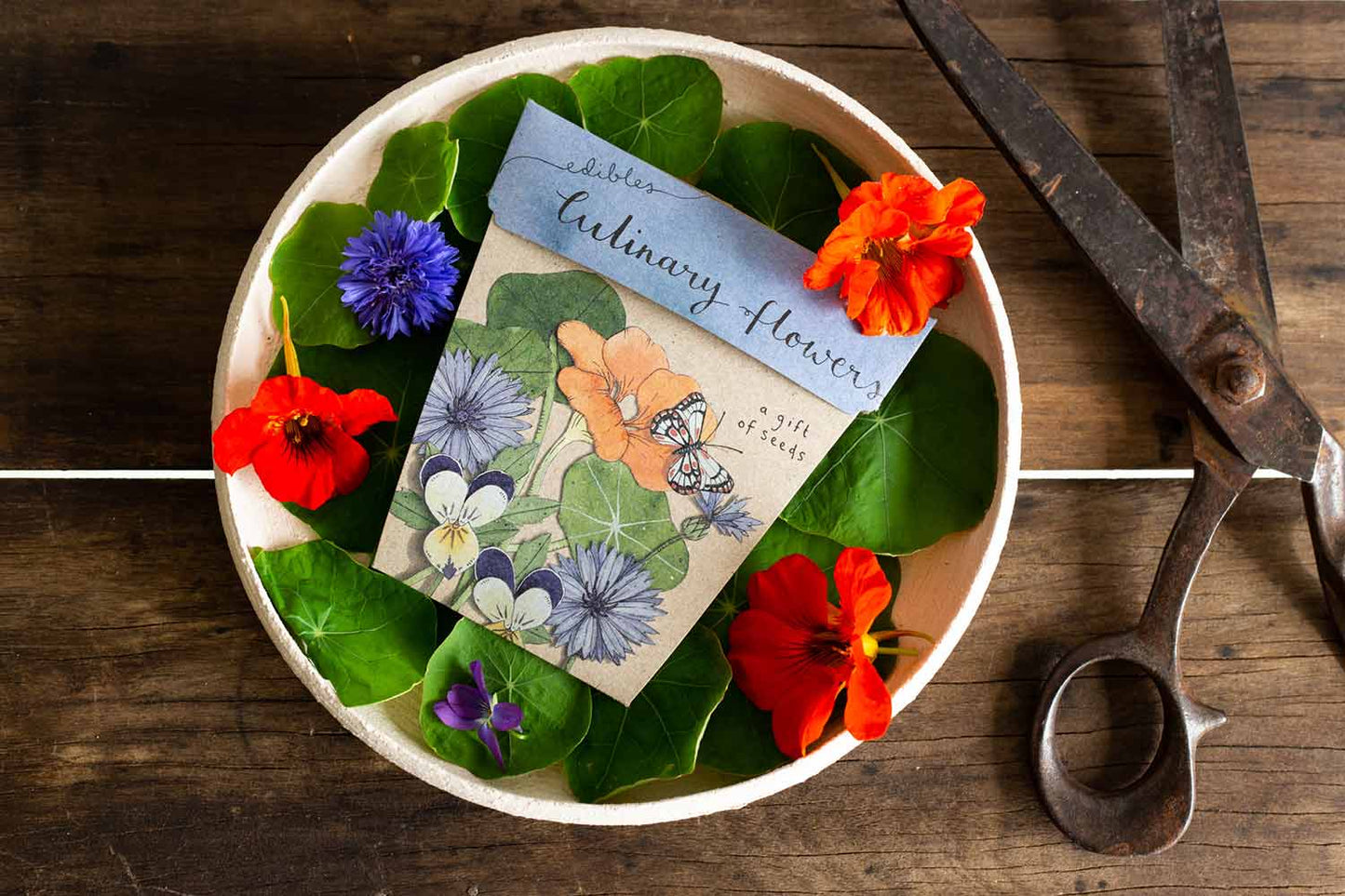 
                  
                    Flowers so beautiful you could eat them? Go ahead with the new Culinary Flowers Gift of Seeds.  Included in the ‘Edibles’ Gift of Seeds range, this will make the perfect gift that is both stunning and useful. This pack contains a mix of nasturtium, viola, and cornflower seeds.
                  
                