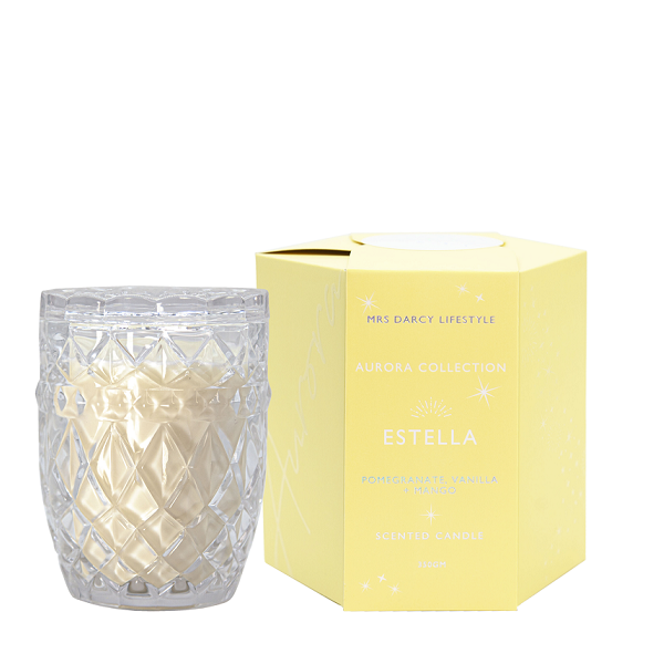 Estella Candle Estella is a sweet cocktail of your favourite fruits, she is the ultimate sweet girl's scent; pomegranate, vanilla + mango.