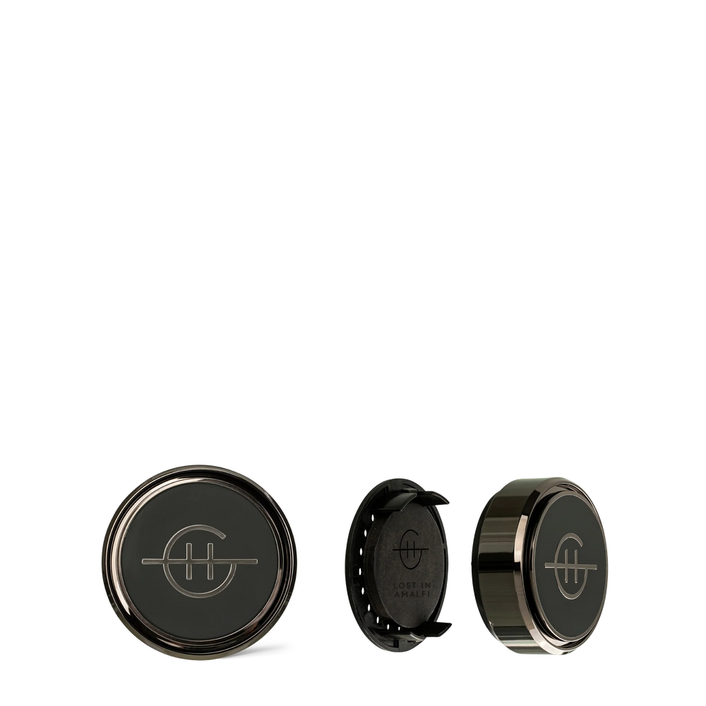 
                  
                    Car Diffuser | Lost In Amalfi Take the high road with a luxury refillable Car Diffuser that doesn't dangle but clips onto your vent like sleek, elegant jewellery. The innovative scent disk is designed to radiate fragrance into every corner of your vehicle for 30 days.
                  
                