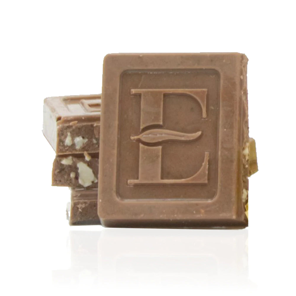
                  
                    Ecuadorian Milk Chocolate with Lemon Myrtle & Sandalwood Nut A satisfying cream crunch of sandalwood nut joins soft & aromatic lemon flavours that are folded into the smooth caramel tones of this decadent milk chocolate
                  
                