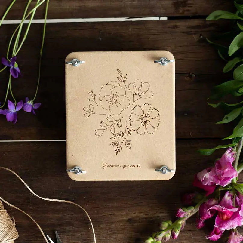 
                  
                    Mini 'Posy' Flower Press Introducing the ‘Posy’ design Mini Flower Press! Eternalise the beauty of your flowers and foliage with this hand crafted gift, made in Australia.
                  
                